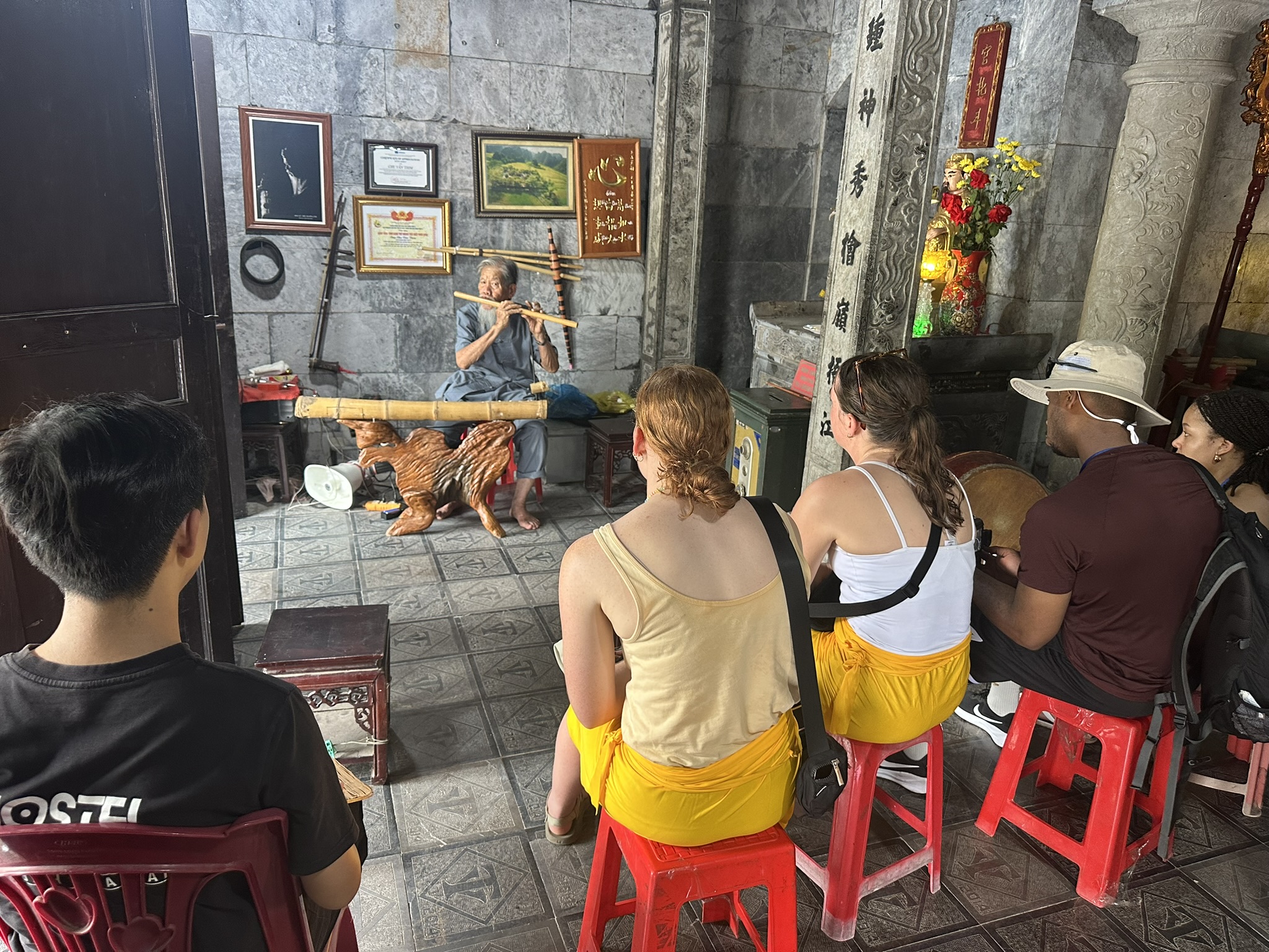 Traditional temple architecture built into the cave